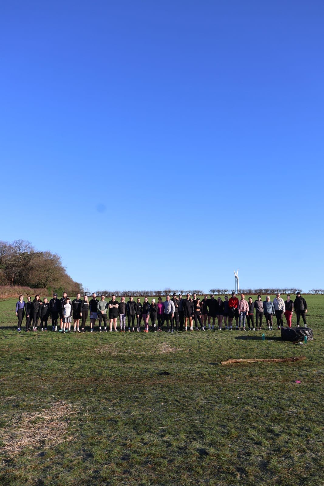 The full Fit Farm group gathered together in the field